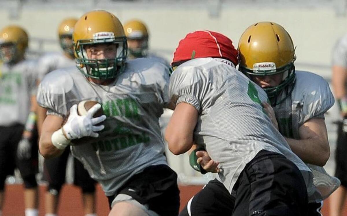 
Accounting for more than 1,800 all-purpose yards last season, Tumwater’s Easton Trakel runs the football during a morning practice Saturday.
