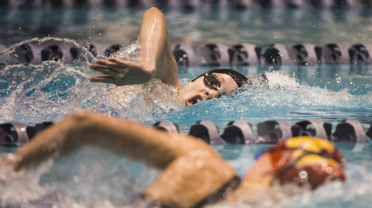 Curtis’ Leigh Lopez-Silvers competes in the 200-yard freestyle event at the 4A girls state swim and dive championships at the King County Aquatics Center in Federal Way, Wash., on Saturday, Nov. 11, 2017.
