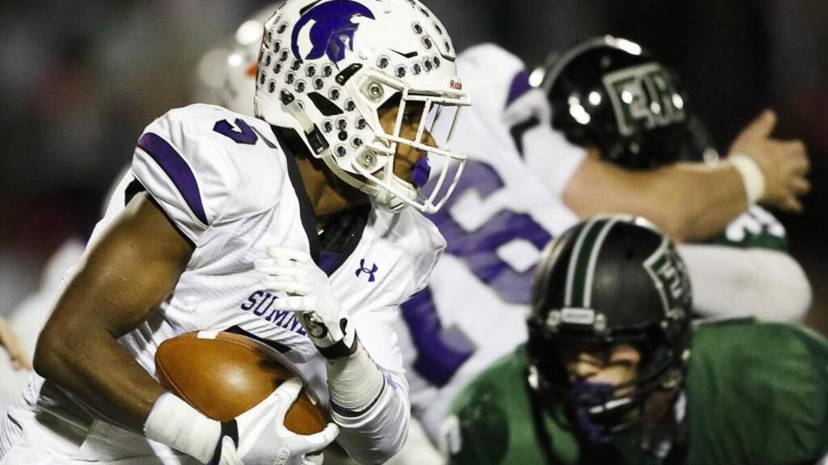 Sumner's Connor Wedington (5) rushes in the second quarter. Emerald Ridge High School played Sumner High School in a football game at Sparks Stadium in Puyallup, Wash., on Friday, October 28, 2016.