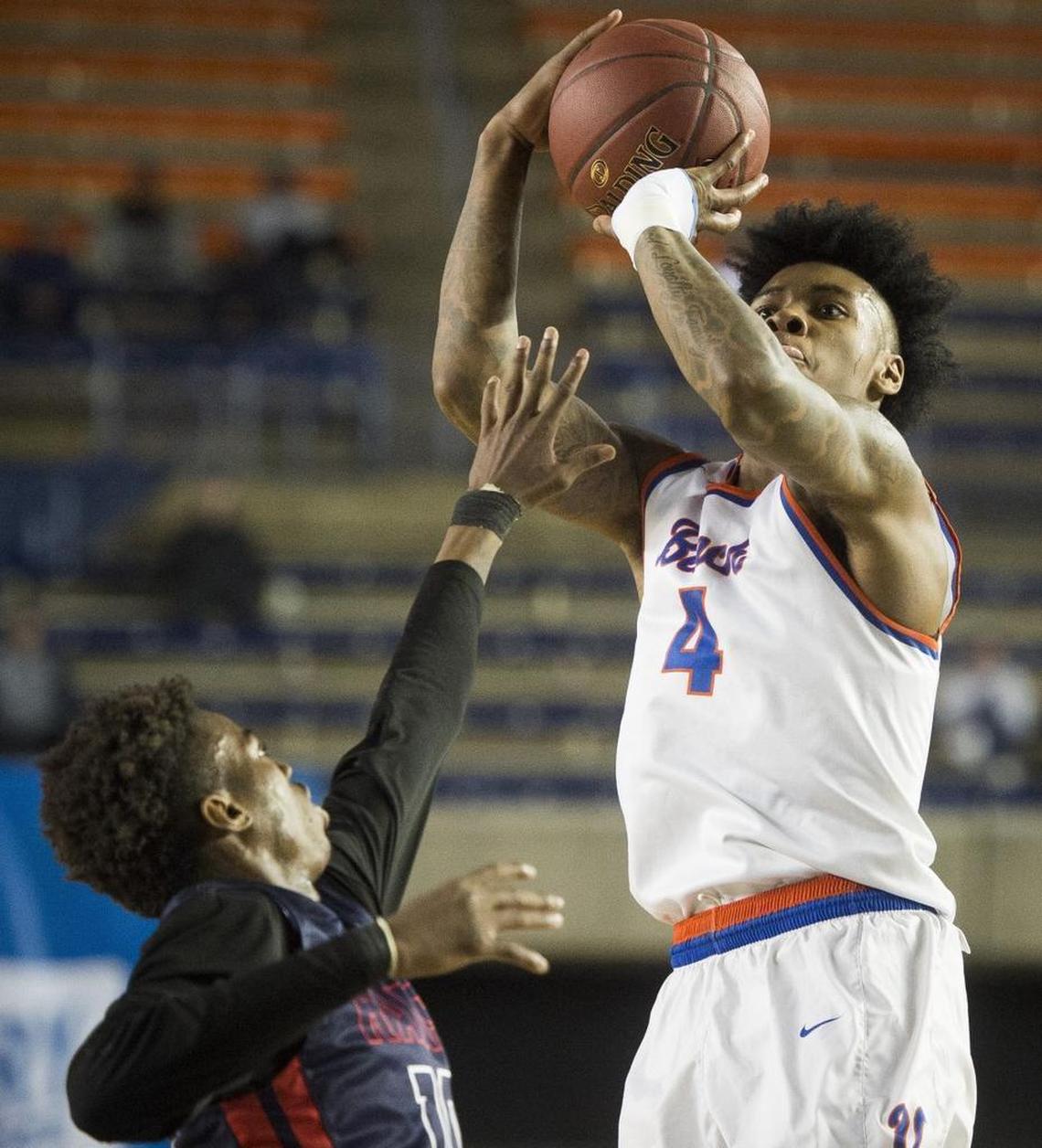 Rainier Beach's Kevin Porter (4) puts up a shot in the first quarter. Wilson played Rainier Beach in a basketball game during the Hardwood Classic state basketball tournament at the Tacoma Dome in Tacoma, Wash., on Thursday, March 1, 2018.