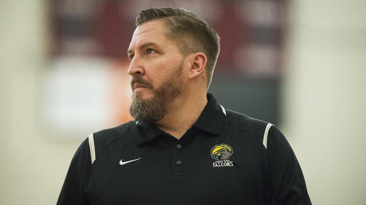 Foss High School coach Mike Cocke' watches the game in the third quarter. Foss played Pullman in a basketball game at Mount Tahoma High School in Tacoma, Wash., on Saturday, Feb. 24, 2018.