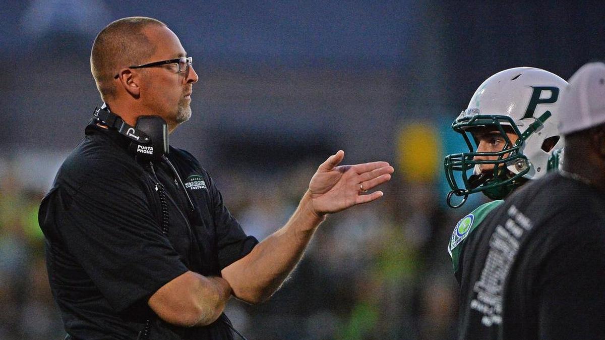 Peninsula High School’s Ross Filkins is going into his fourth year as the school’s athletic director, in addition to his head coaching duties with the football team.