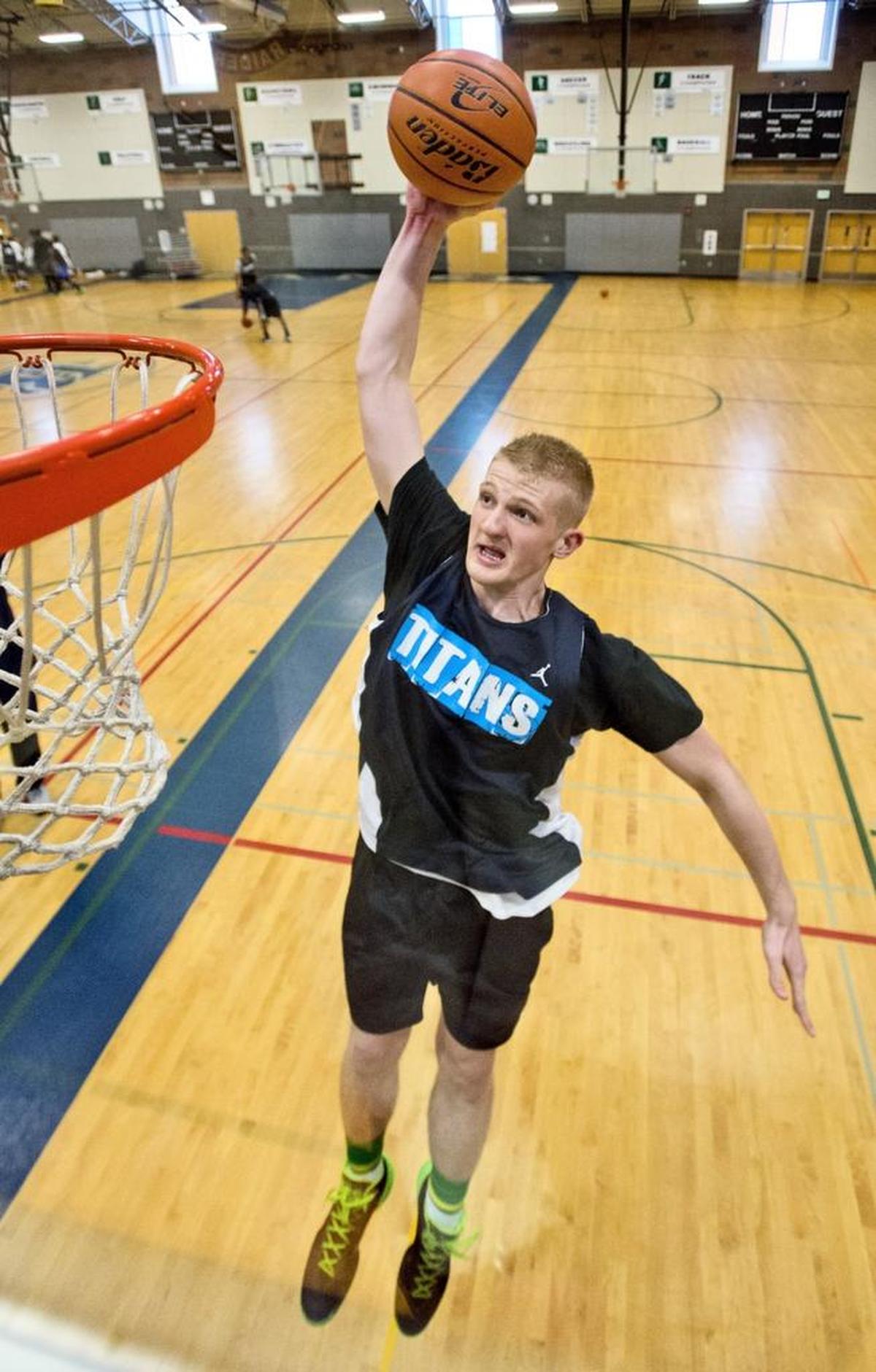 Bogdan Bliznyuk plays basketball at Todd Beamer High School in Federal Way, February 24, 2014. He was selected All Area Boys Basketball Player of the Year.