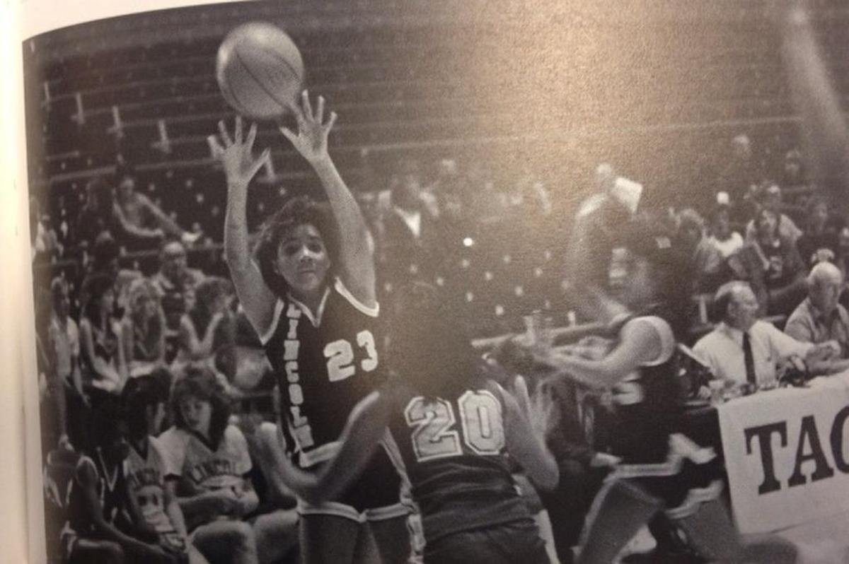 Photo of Elizabeth Larson in Lincoln’s 1985 yearbook playing in the Tacoma Dome. She played her senior year at Lincoln after transferring from Rogers High School in Puyallup.