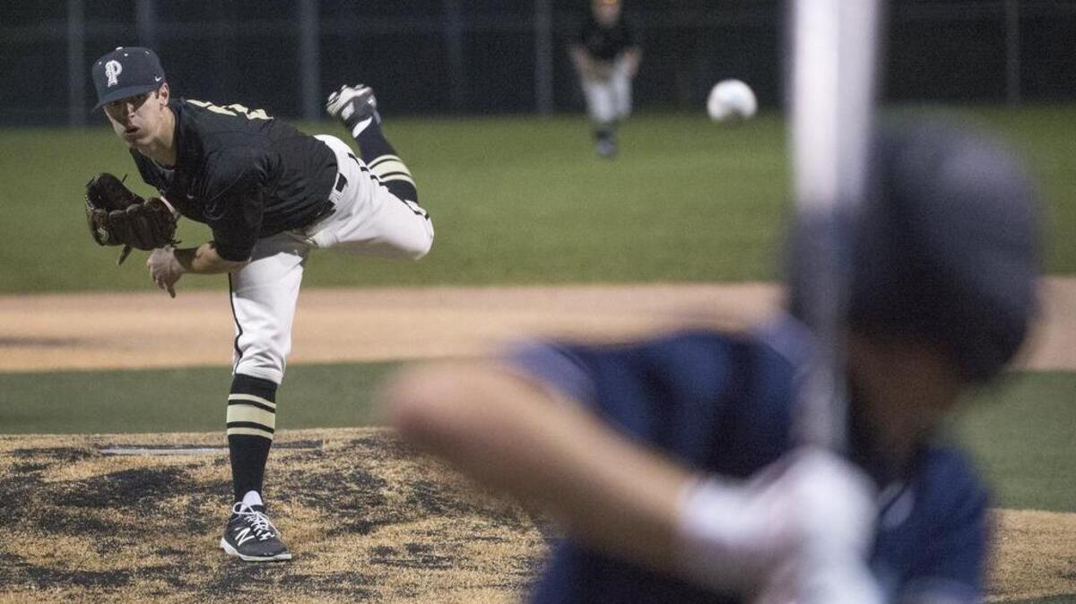 Puyallup’s Chris Micheles struck out eight batters in six innings against Rogers on Friday. “We want to win our own state title,” he says.