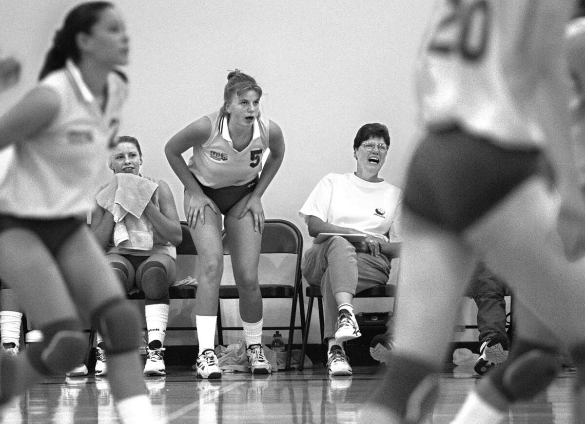 In a 1995 News Tribune photo, Fife High School volleyball coach Jan Kirk (center) shouts instructions during the last minutes of a game with North Thurston High School, which her Fife team won. Kirk died this past week, age 80. (Russ Carmack/The News Tribune)