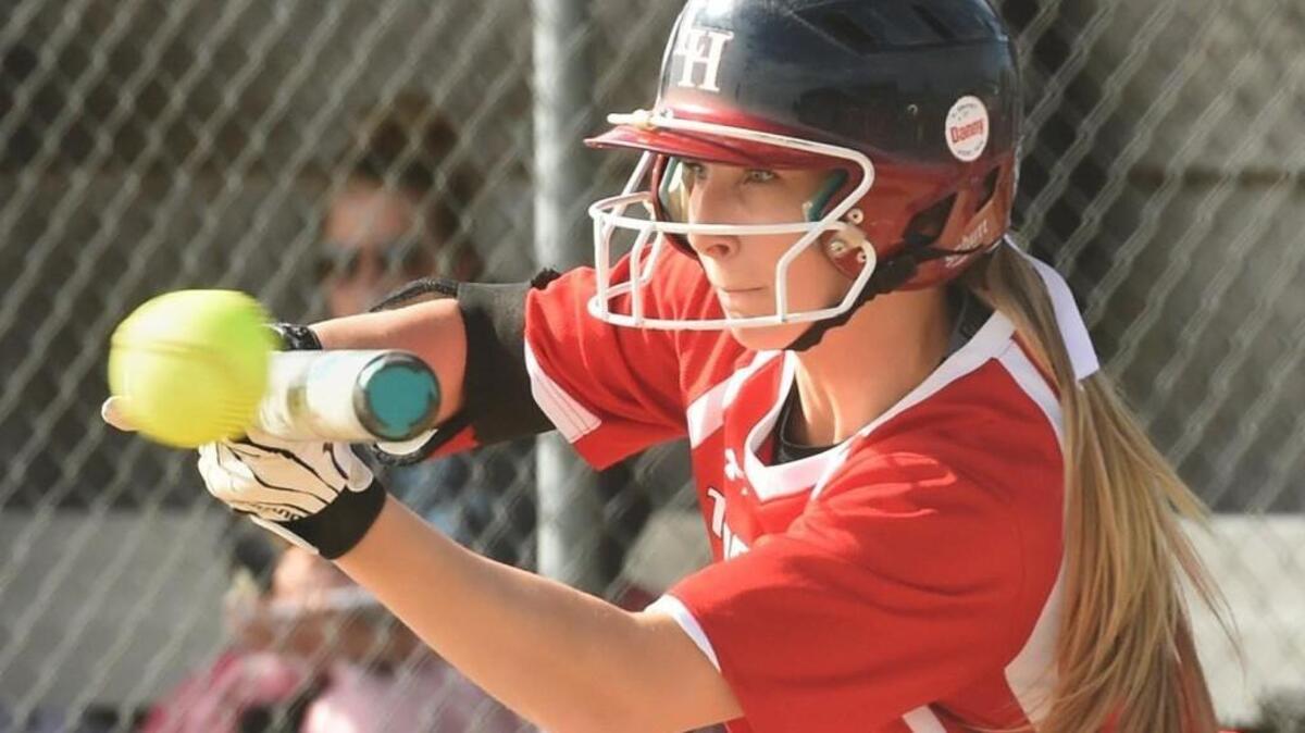 Tornados' Ally Choate drops a bunt down as Yelm and Gig Harbor battled it out for the 3A South Sound Conference softball title May 8th in Yelm, with the host Tornados winning 2-0.