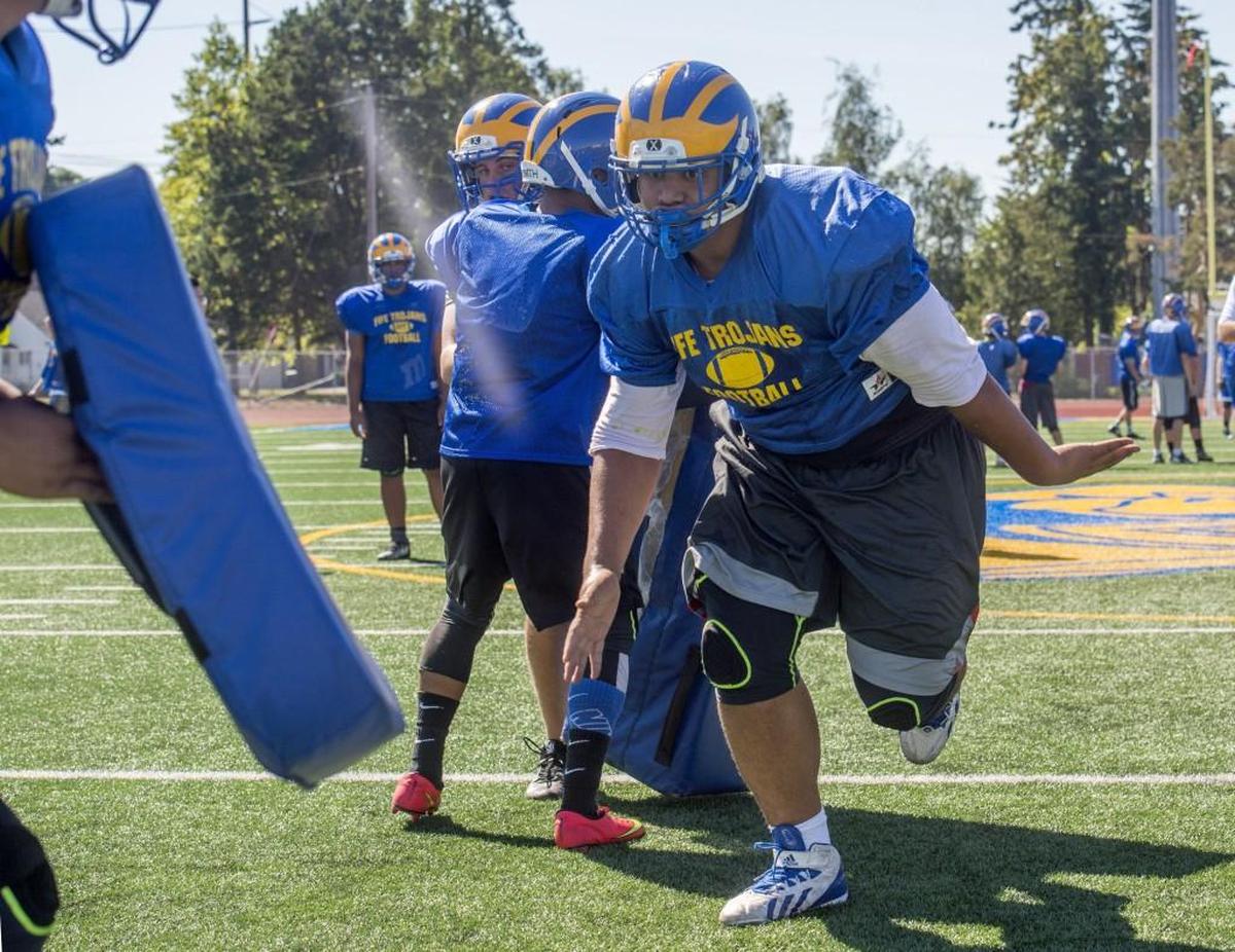 Lineman Ulumoo “MJ” Ale runs a drill during football practice at Fife High School. Ale, a former rugby player in Australia, will play nose guard, defensive tackle, and will be a fixture at right tackle on the offensive line., August 25, 2016.