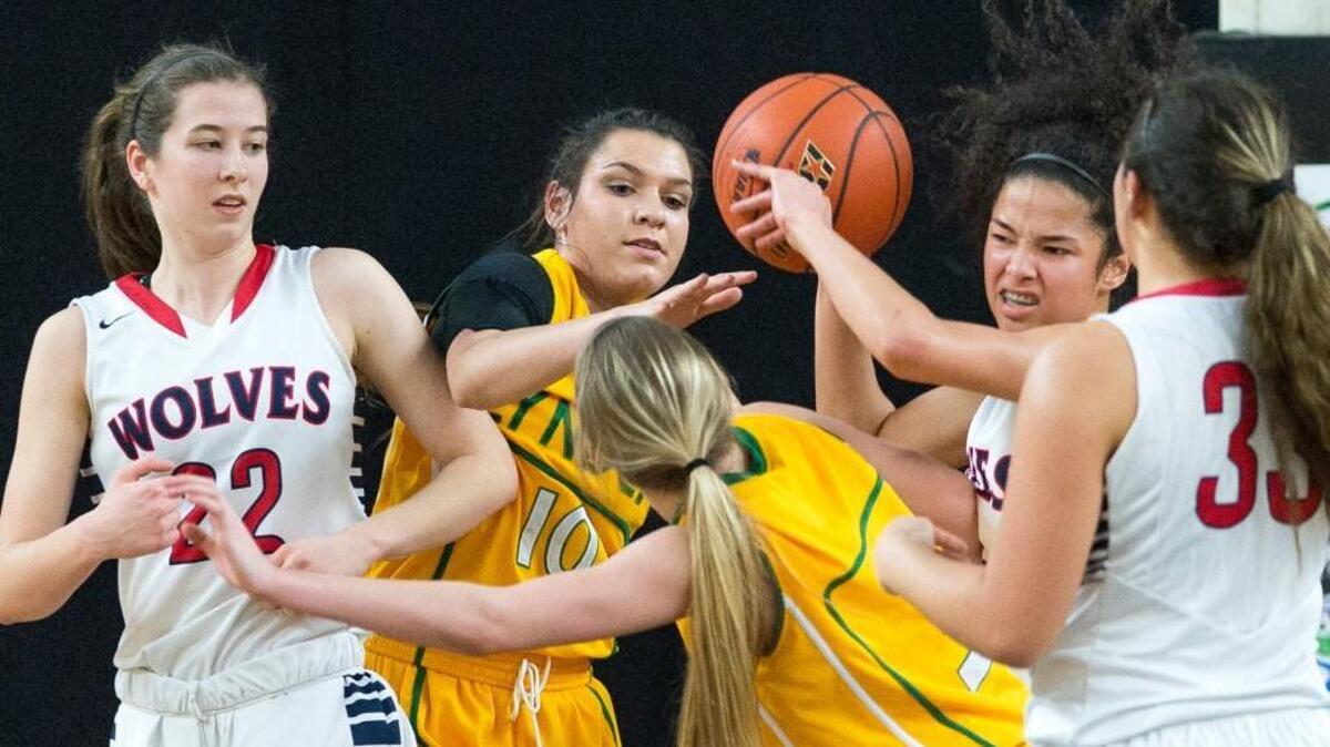 Black Hills' Maisy Williams rebounds the ball during a 2A girls' state quarterfinal game on Thursday, March 3, at the Yakima Valley SunDome in Yakima, Wash. Lynden won the game 59-44.