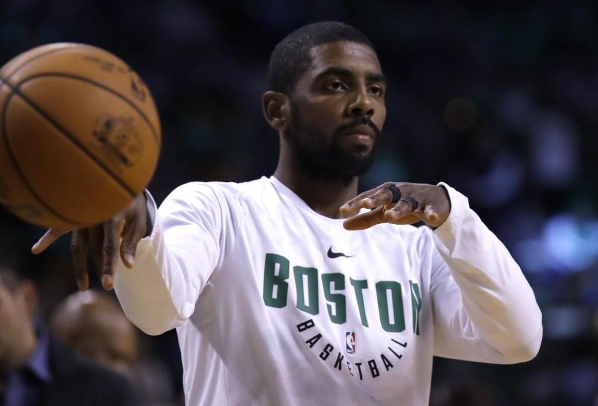 Boston Celtics guard Kyrie Irving warms up prior to an NBA basketball game, Wednesday, Oct. 18, 2017, in Boston. (AP Photo/Charles Krupa)