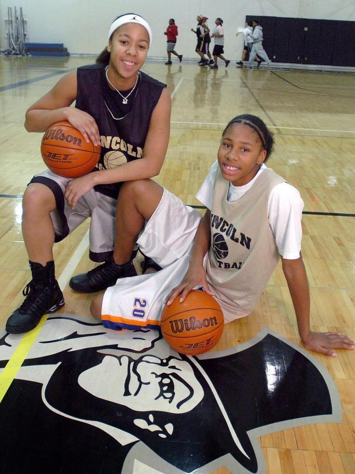 Jazzmn Montgomery, senior point guard, left, and sophomore wing Alex Montgomery. They were photographed at the start of practice at the school in Tacoma on Dec. 22, 2004.