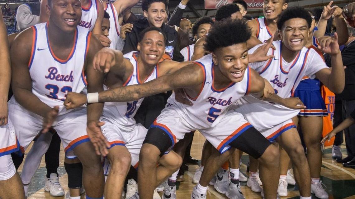 Led by Kevin Porter (#5), Rainier Beach shimmy-shakes while waiting for the 3A championship trophy to arrive. Photo taken in Tacoma on Saturday, Mar. 5, 2016.