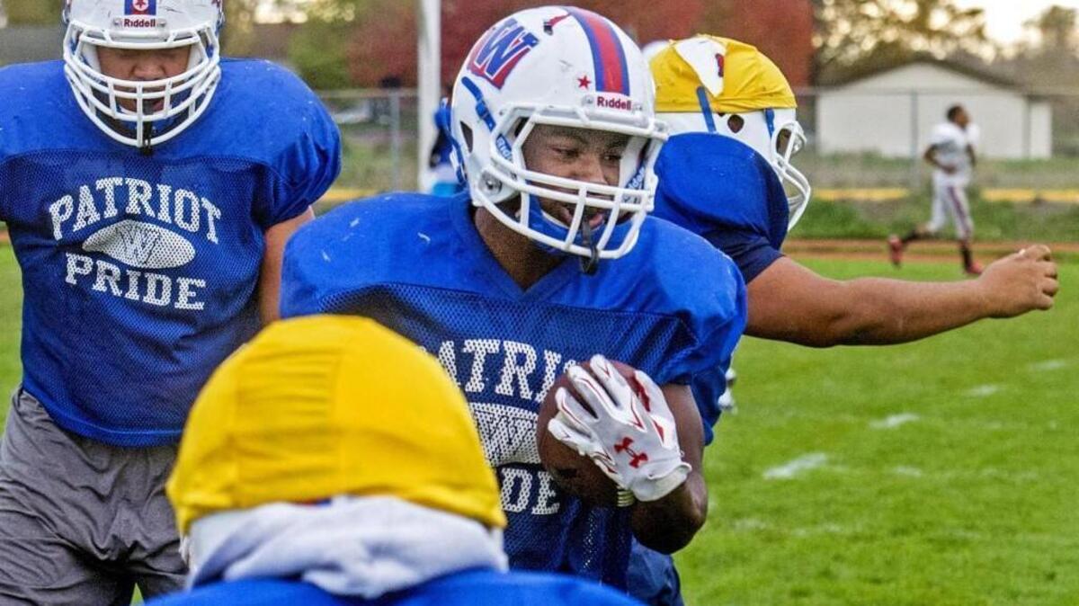 Running back Tariq Ellis practices at Washington High School, Oct. 22.