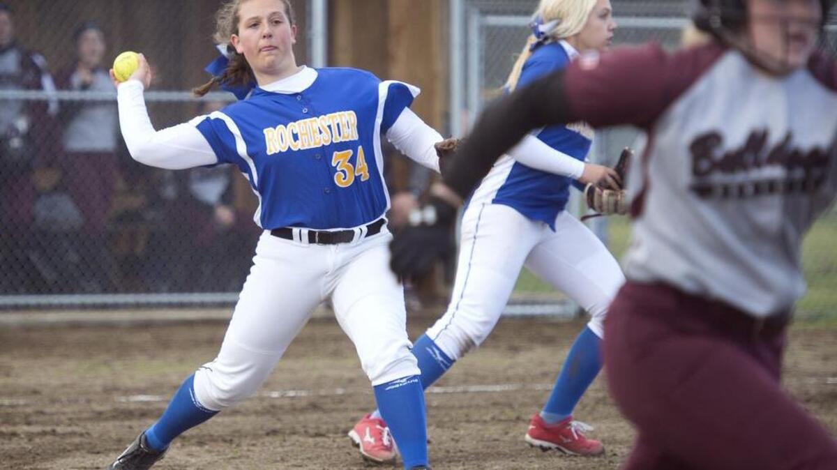 Rochester third baseman Bella Phelps throws out Montesano’s Morgan Kersker during Wednesday’s doubleheader.