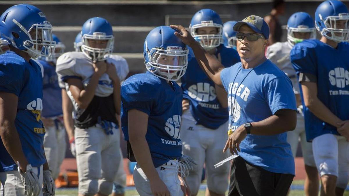 Stadium football coach Thomas Ford directs his players during football practice at stadium Bowl in Tacoma on Friday, Aug. 24, 2016.