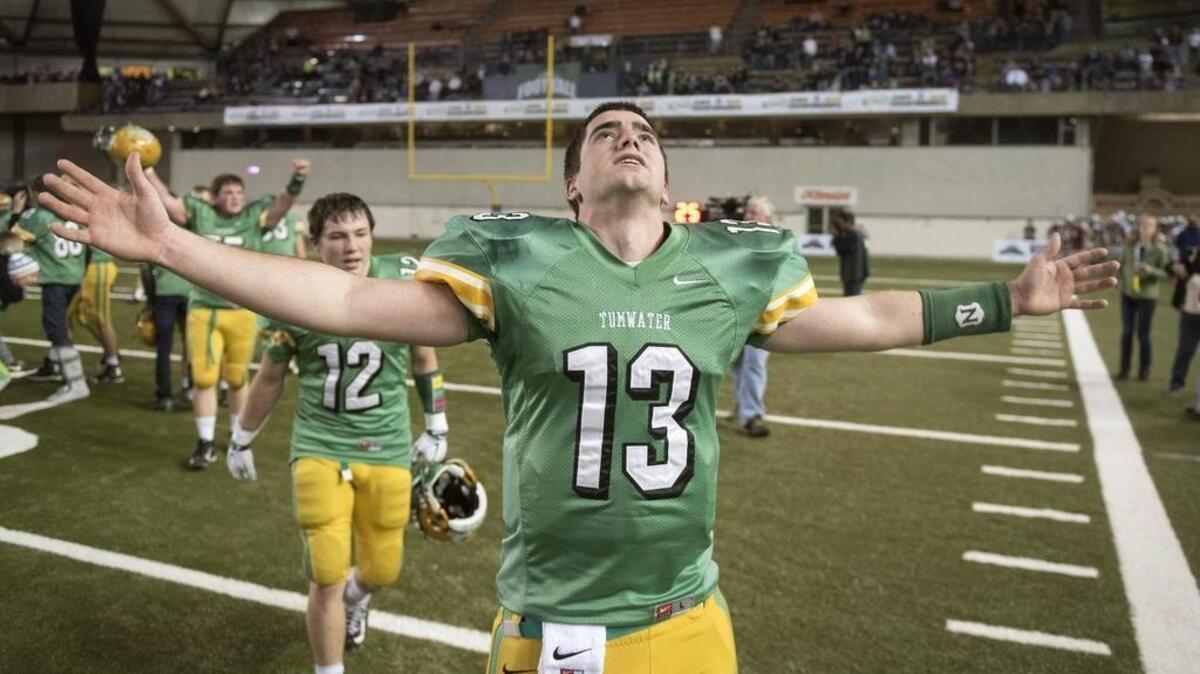 Spencer Dowers, who threw for two TDs, reacts after the T-Birds’ win.