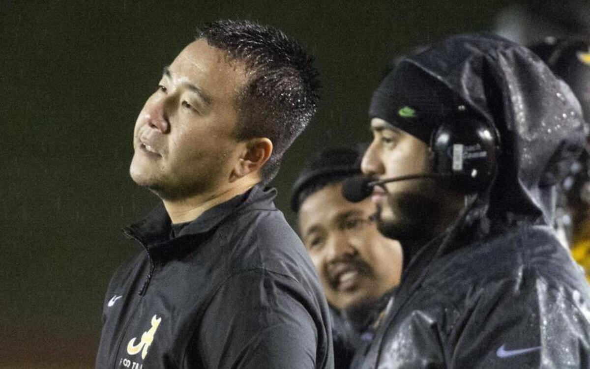 Lincoln coach Masaki Matsumoto reacts as Bonney Lake continued a late touchdown drive. Photo taken in Tacoma on Friday, Nov. 13, 2015.