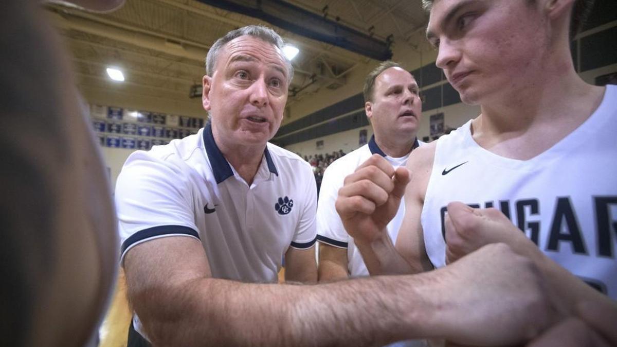 Cascade Christian head coach Jerry Williams fires up the Cougars before Tuesday night's boys basketball game against Seattle Christian at Cascade Christian High School in Puyallup, Feb. 6, 2018.
