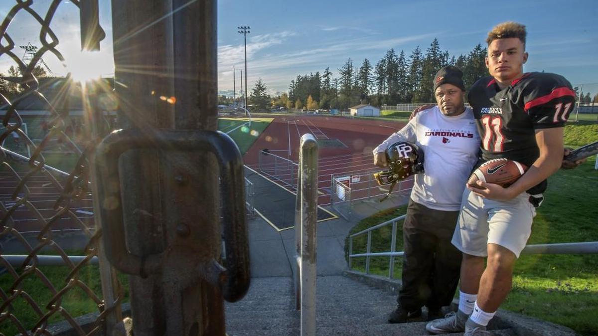 Frankln Pierce High School's do-everything quarterback Willie Patterson , right, is the son of former Mount Tahoma and Central Washington All-American tailback Pat Patterson. The senior Patterson is an assistant coach for the Cardinals and is riding a wave of success so far this year thanks in part to his son's play Wednesday.