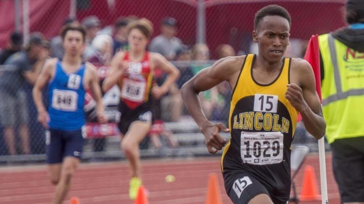 James Mwaura of Lincoln has a big early lead in the boys 3A 3200 meter run at the state 2A, 3A, and 4A track and field championships meet at Mt. Tahoma High School, May 26, 2018.