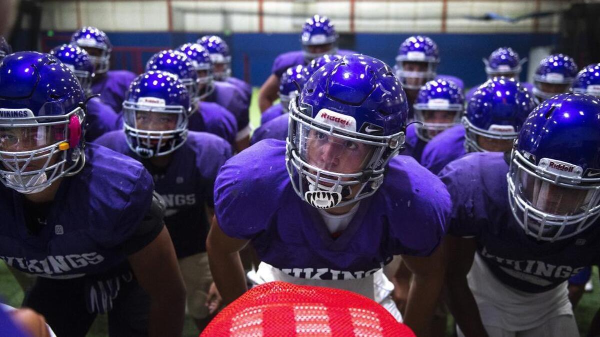 Puyallup Vikings line up for preseason football practice at New Level 360 indoor training center in Puyallup on Tuesday, Aug. 21, 2018.