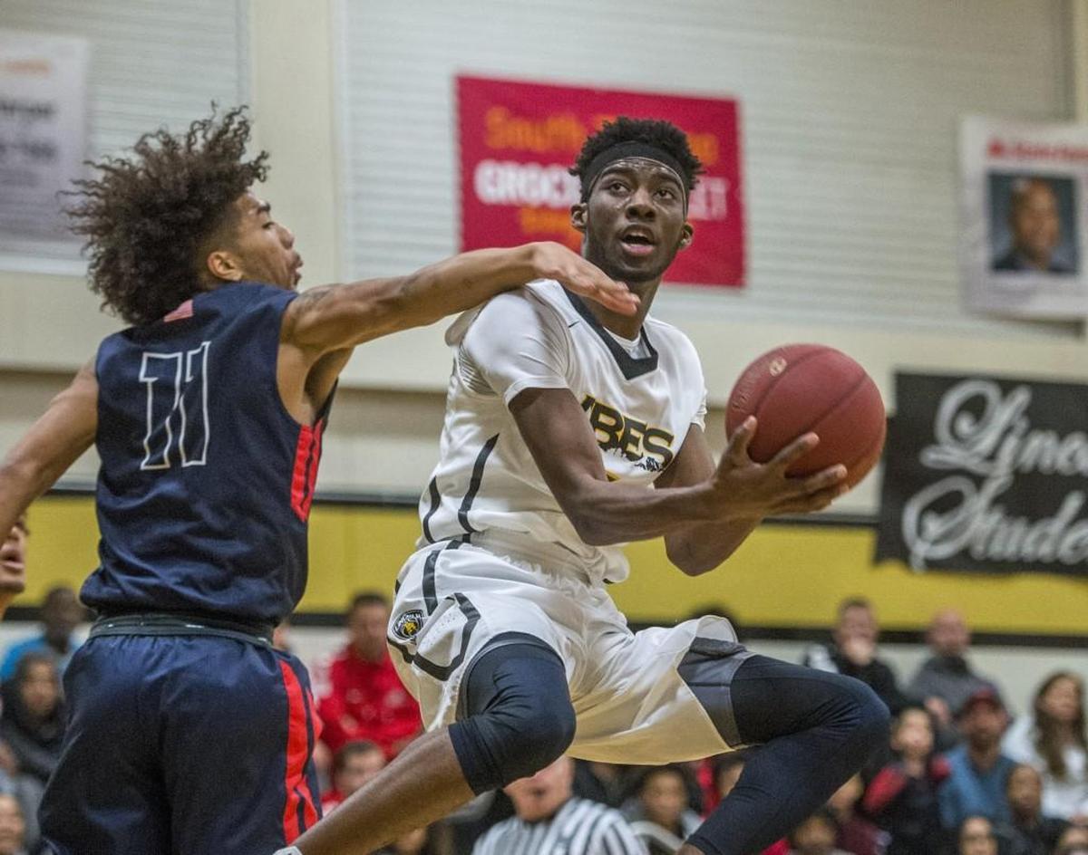 Willie Thomas of Lincoln High School in a boys basketball game at Lincoln, December 15, 2017. Lincoln beat Wilson 61-53.