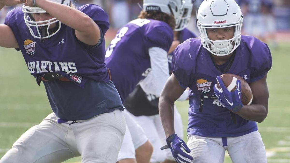 Sumner running back Connor Wedington, right, split carries last year, but had 2,366 all-purpose yards. It’s the UW commit’s show now.