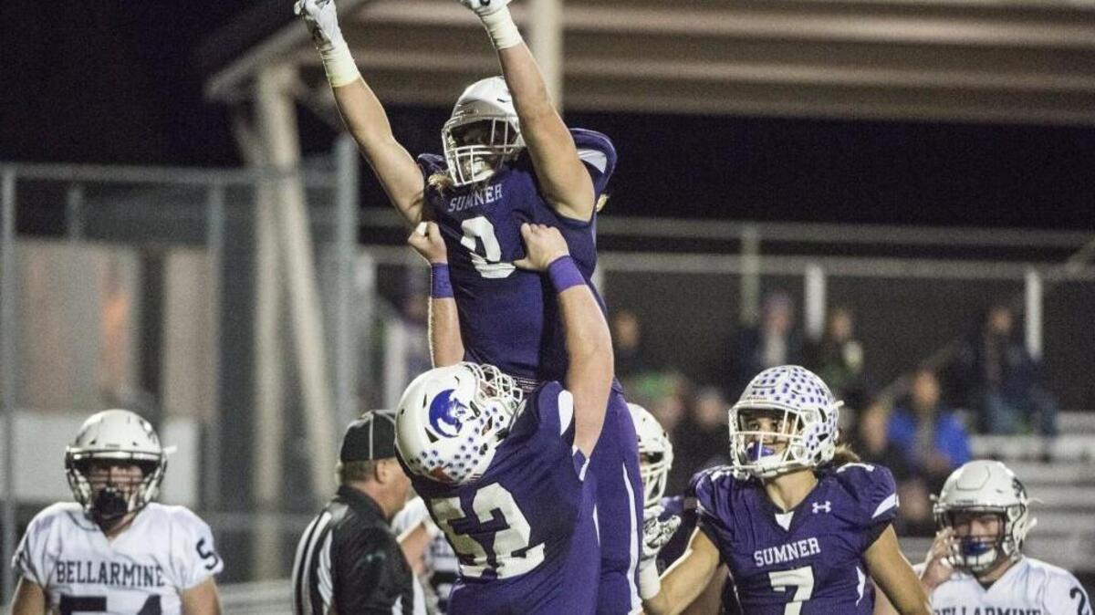 Ben Wilson celebrates a touchdown in the first quarter. Sumner played Bellarmine Prep in a football game at Sunset Stadium in Sumner, Wash., on Friday, Oct. 13, 2017.