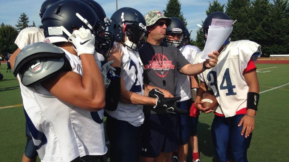 
Second-year Black Hills High School football coach Kirk Stevens directs traffic during a passing drill at practice Wednesday.
