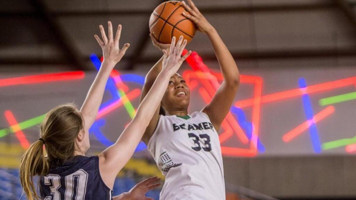 Darion Brown of Todd Beamer High School takes a shot in a girls basketball game at the WIAA state 4A championships in the Tacoma Dome, March 3, 2016. Todd Beamer advances after beating Skyview, 40-35.