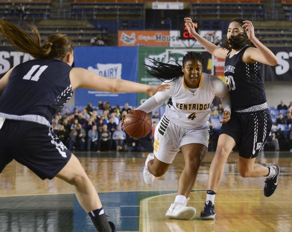 Kentridge's Morgan Gary (4) signed her letter of intent to play basketball at Northern Arizona University next year.