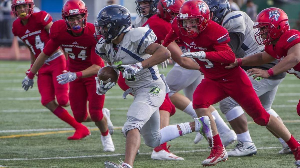 Todd Beamer High School running back Billy Vann picks up a big gain in a football game against Kennedy Catholic at Highline Memorial Stadium in Burien on Saturday, Oct. 6, 2018.