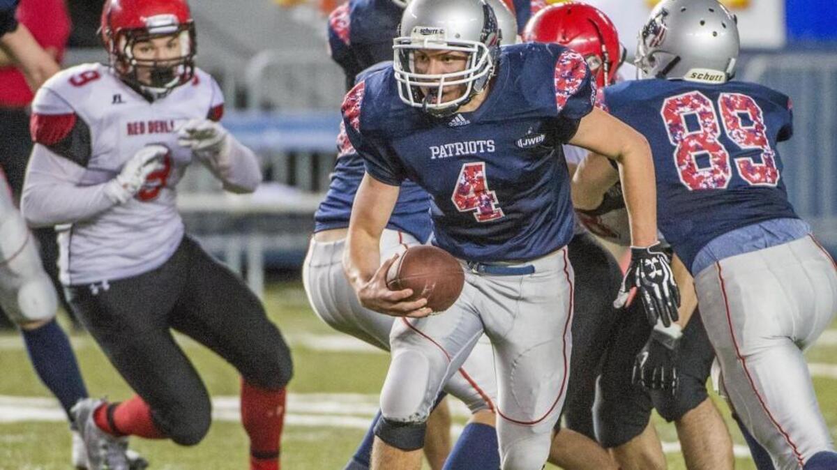 John Lesser of the Liberty Christian, pictured at the Tacoma Dome in December, set the Class 1B career state rushing record Friday.