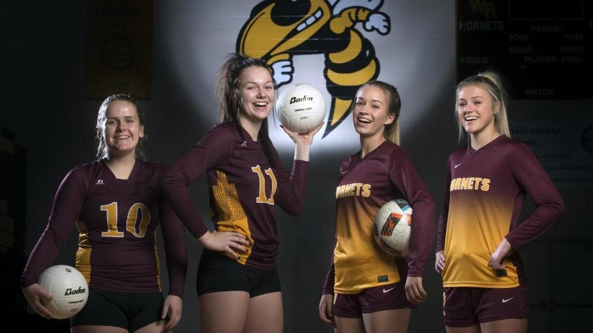 White River senior volleyball teammates (from left) Hope Baldyga and Keegan Strobeck and soccer teammates Annabelle Hall and Haylee Gunter have their respective Hornets teams undefeated at 15-0 entering the postseason. They are shown at White River High School in Buckley on Thursday, Oct. 26, 2017.