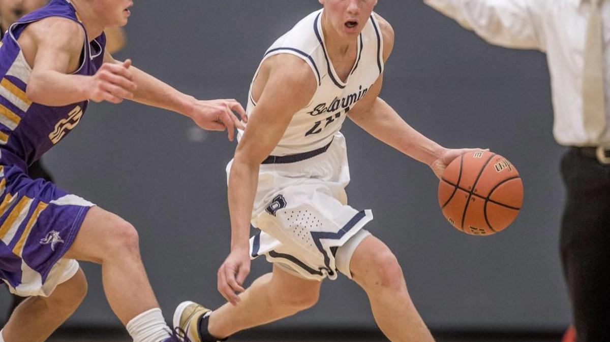 Malachi Flynn of Bellarmine dribbles as he’s chased by Landen Neff of Puyallup in the final game of the Bellarmine Christmas Classic basketball tournament in December.