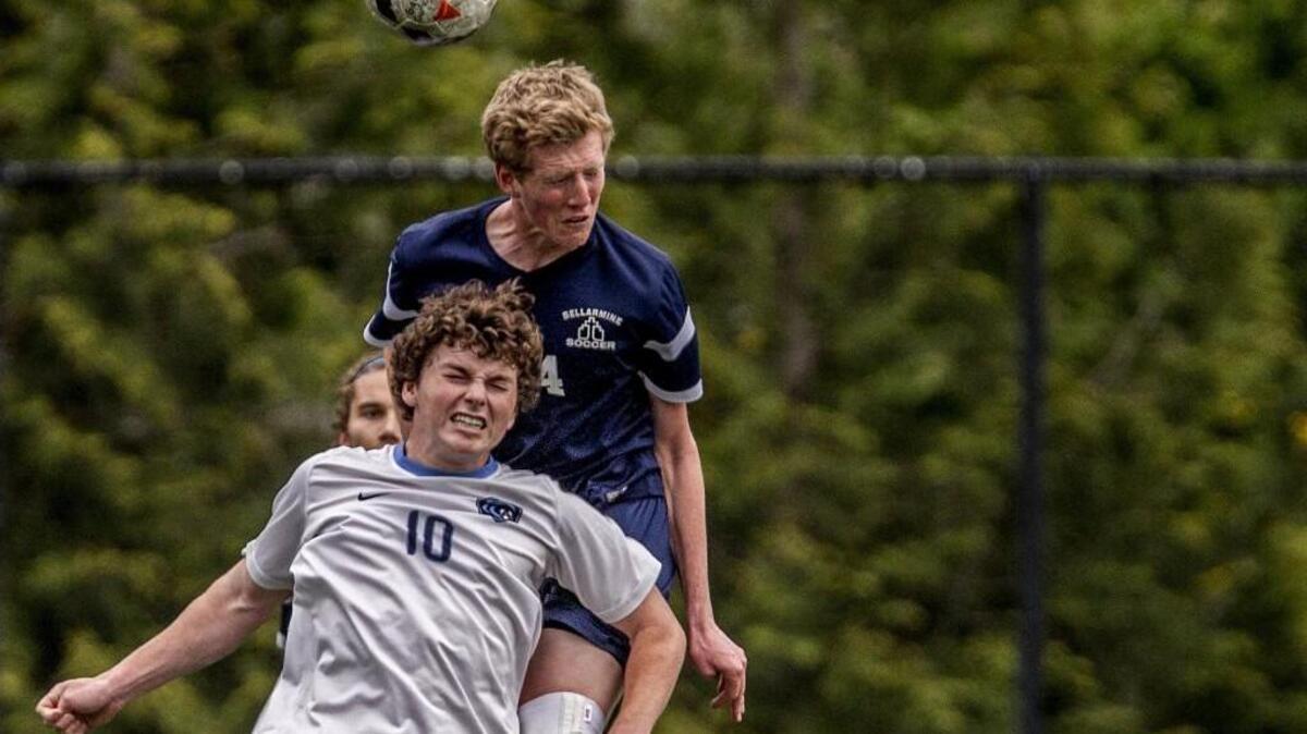 Gig Harbor’s Chase Tovey (10) battles Bellarmine’s Elijah Wolf for the ball on Thursday.