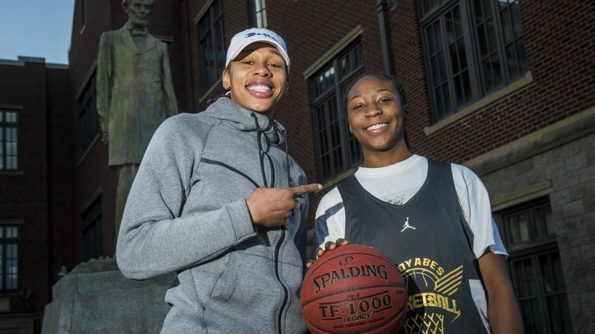 Lincoln’s Kondalia Montgomery, right, stands for a portrait with her sister and WNBA player Alex Montgomery outside Lincoln High School in Tacoma, Wash., on Sunday, Feb. 11, 2018. Kondalia is a senior this season and was recently selected as the 3A Pierce County League most valuable player, following in the league-MVP footsteps of Alex.