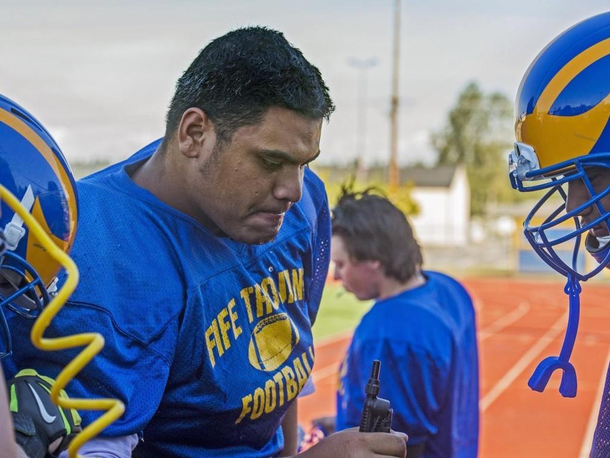 Lineman MJ Ale in football practice at Fife High School, August 25, 2016.