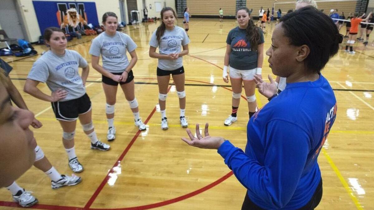 
Auburn Mountainview coach Telia Peterson, in her second season, talks with her players during practice Thursday. The team is coming off a 15-4 Class 3A South Puget Sound League record in 2014, and has set its sights this year on reaching the postseason.

