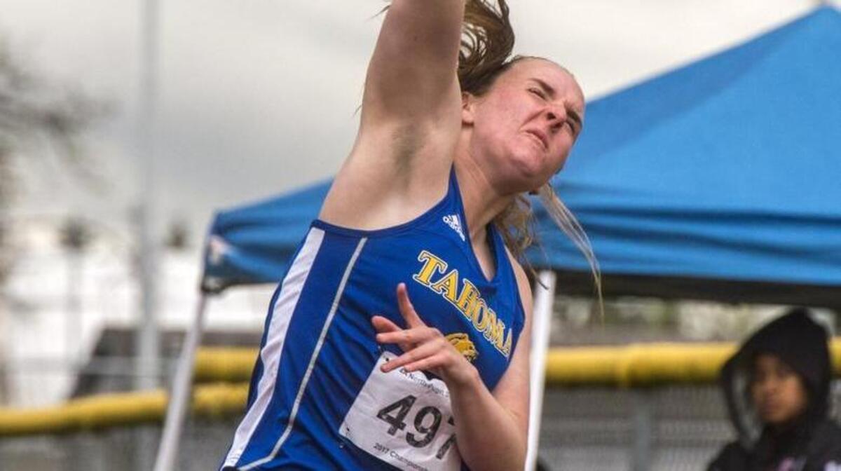 Ginny Mehl of Tahoma hurls a javelin on her way to winning the event at the NPSL AAAA subdistrict track and field meet held at French Field in Kent on May 12.