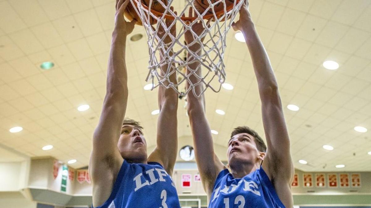 Life Christian has a pair of dunking guards, 6-5 Reid Roelofs (left) and 6-7 Luke Lovelady. Life Christian will play Lind-Ritzville/Sprague in the quarterfinals Thursday.