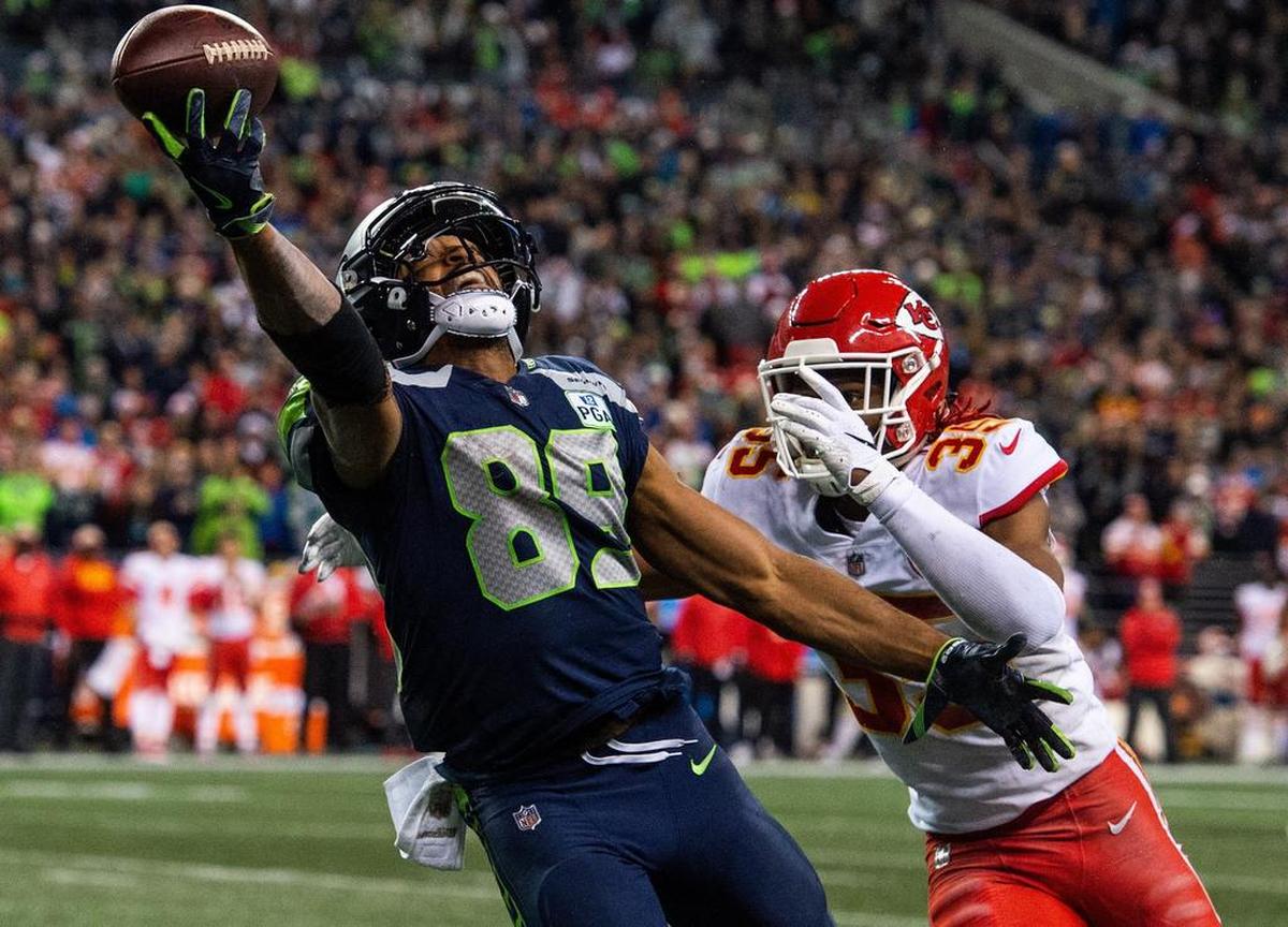Seahawks wide receiver Doug Baldwin makes a one-handed catch over Chiefs defensive back Charvarius Ward in the final minutes of Seattle’s home win in December. Baldwin, 30, has had multiple surgeries since the end of the season, and the team doesn’t know when he will be back on a field training.