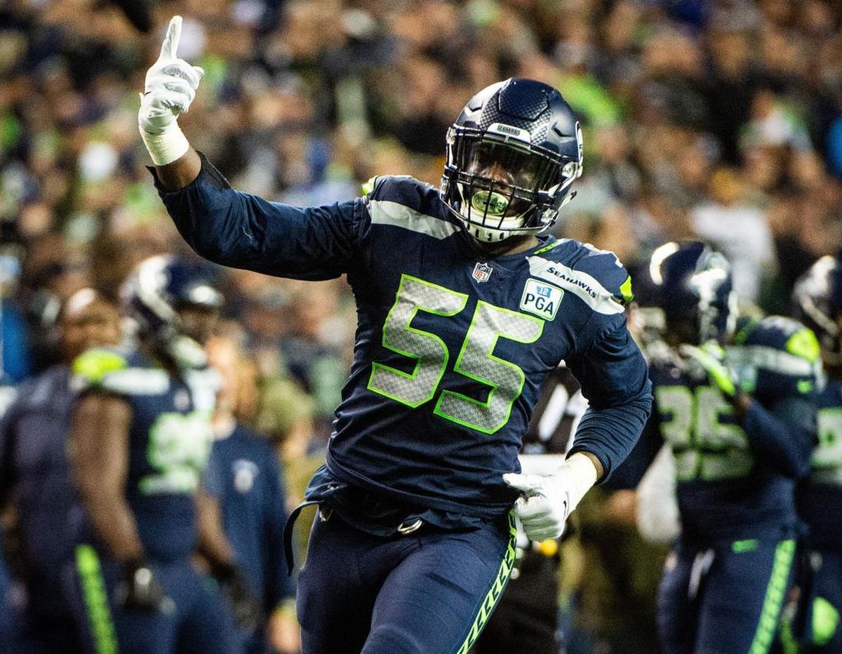 Seahawks defensive lineman Frank Clark celebrates a sack of Packers quarterback Aaron Rodgers in the third quarter. The Seattle Seahawks played the Green Bay Packers in a NFL football game at CenturyLink Field in Seattle, Wash., on Thursday, Nov. 15, 2018.