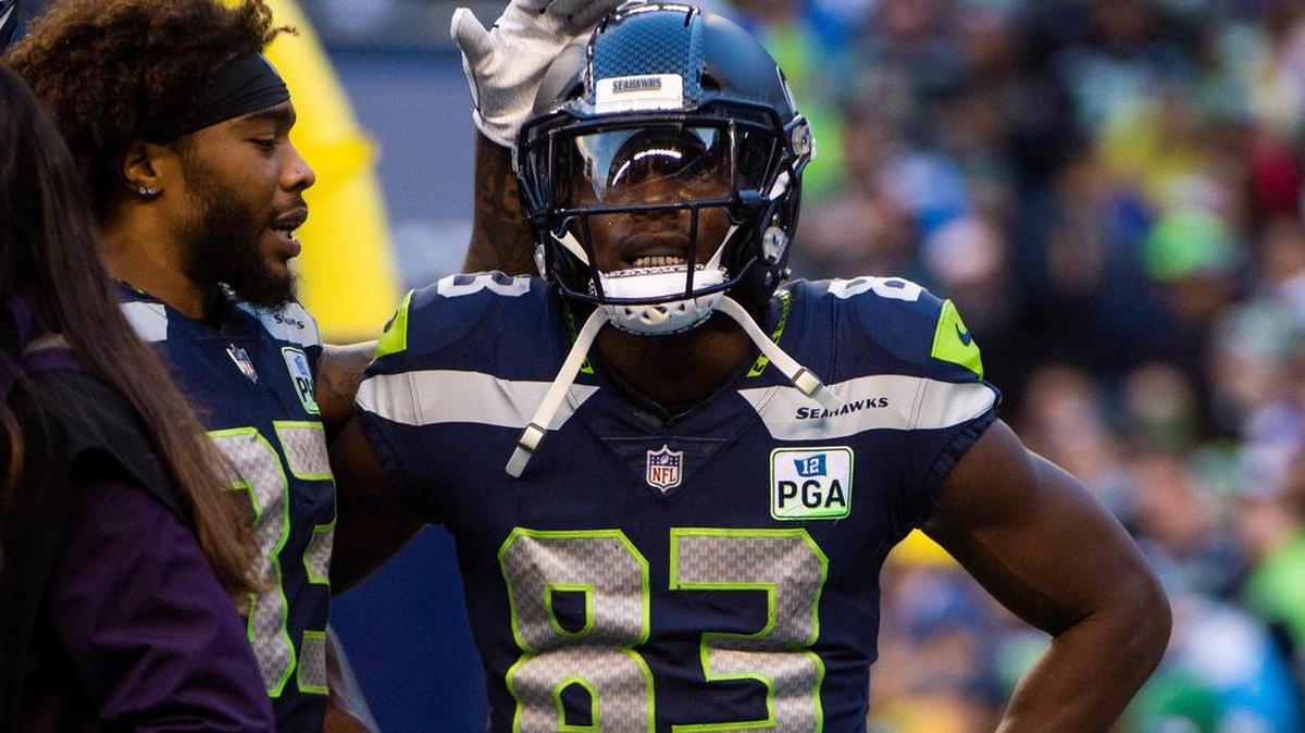 Second-year wide receiver David Moore (83) consoled by Seahawks free safety Tedric Thompson (33), after Russell Wilson’s last-play pass got deflected and went off Moore’s chest in the end zone to seal Seattle’s loss last weekend to the Los Angeles Chargers.
