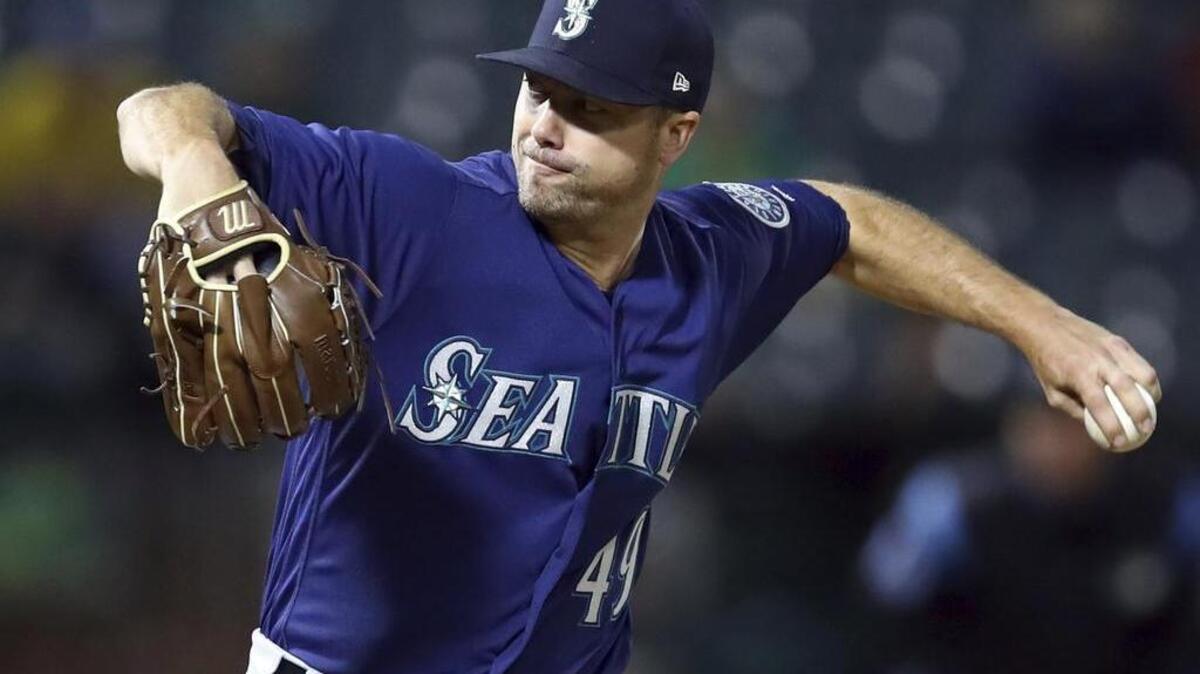 Seattle Mariners pitcher Wade LeBlanc works against the Oakland Athletics during the second inning of a baseball game Thursday, Aug. 30, 2018, in Oakland, Calif. (AP Photo/Ben Margot)