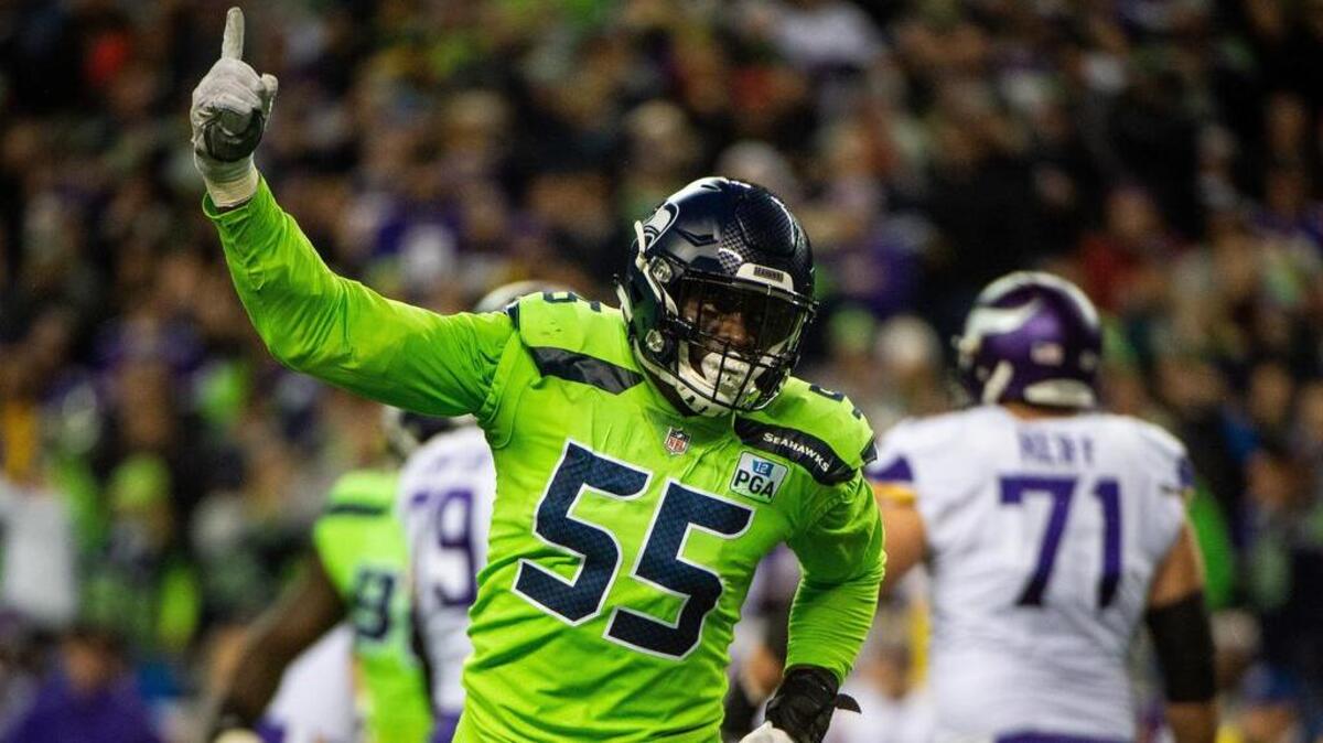 Seahawks defensive end Frank Clark celebrates after sacking Vikings quarterback Kirk Cousins in the second quarter of Seattle’s last home game, Dec. 10. Tuesday began a two-week window in which Seattle can designate Clark to receive a 2019 franchise tag to keep him and his expiring contract from entering free agency next month.