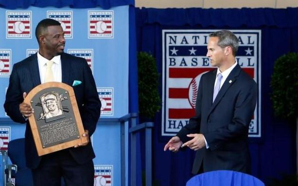 National Baseball Hall of Fame inductees Mike Piazza, left, and Ken Griffey Jr. hold their plaques for photos after the induction ceremony at Clark Sports Center on Sunday, July 24, 2016, in Cooperstown, N.Y.