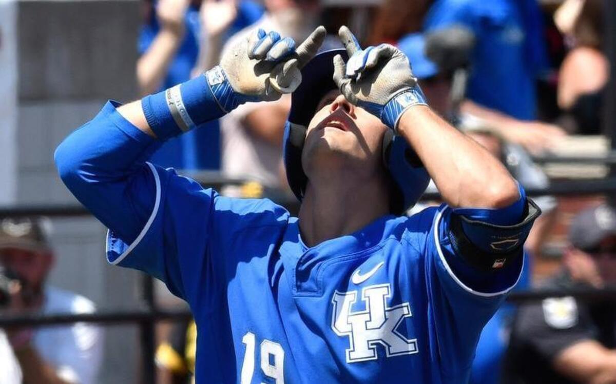 Kentucky infielder Evan White (19) points skyward as he crosses home plate following his solo home run in the ninth inning during the NCAA college baseball super regionals, Friday, Jun. 9, 2017, at Jim Patterson Stadium in Louisville, Ky. Louisville won 5-2.