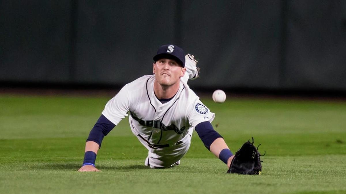 
Mariners center fielder Shawn O’Malley dives for a hit by Houston’s Colby Rasmus in the fourth inning Wednesday. The game was in progress when The Olympian went to press. Read all about it at theolympian.com.
