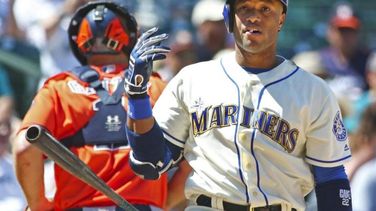 Down by four runs, Seattle Mariners second baseman Robinson Cano flips his bat after striking out to end the fifth inning on Sunday, July 17, 2016, at Safeco Field in Seattle.